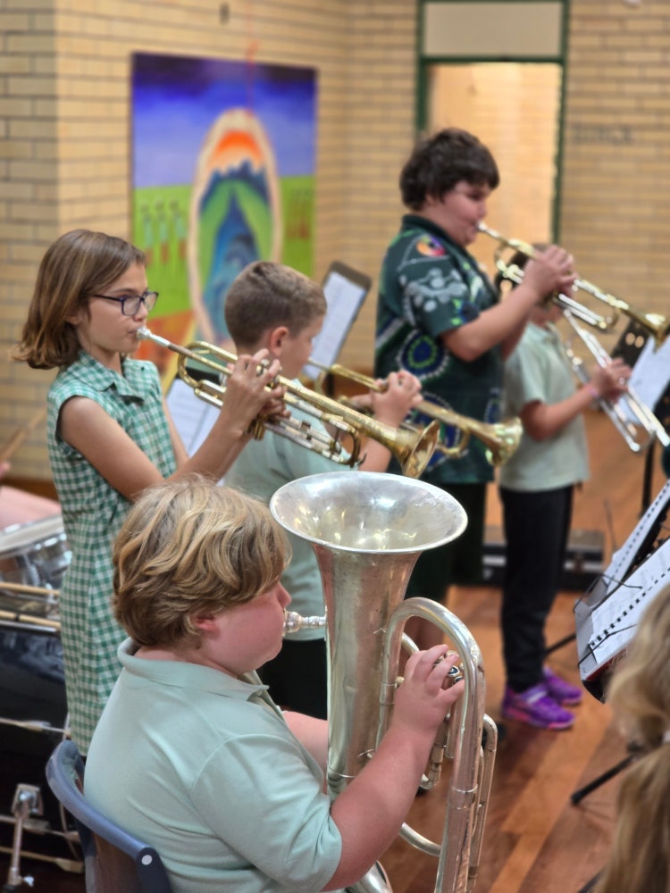 Students playing instruments