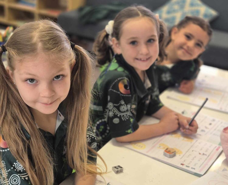 Three students learning