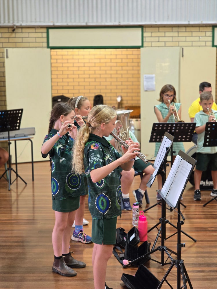 Students playing instruments in band